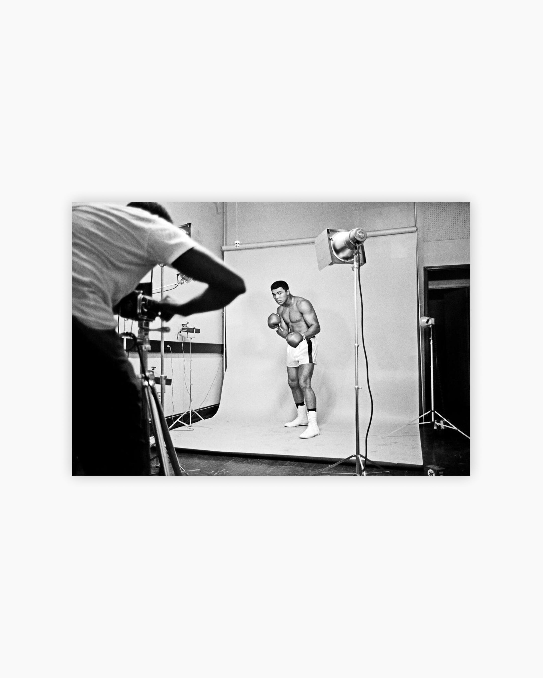 Muhammad Ali posing for a studio photographer. Chicago river, Illinois, 1966
