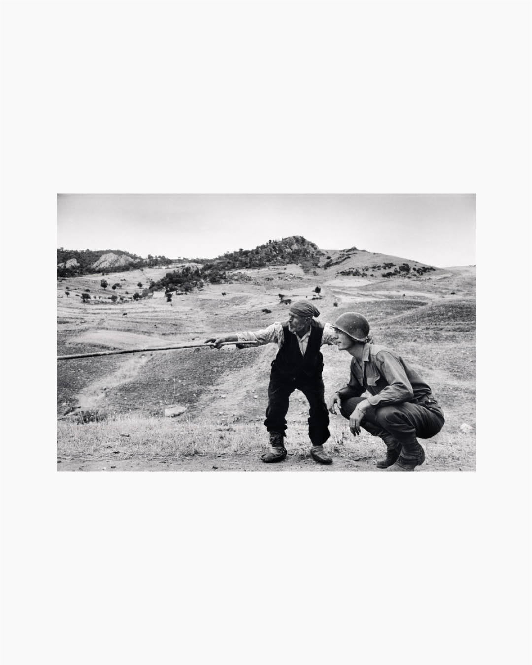 Fine Print: Sicilian peasant telling an American officer which way the Germans had gone. Near Troina, Italy, August, 1943