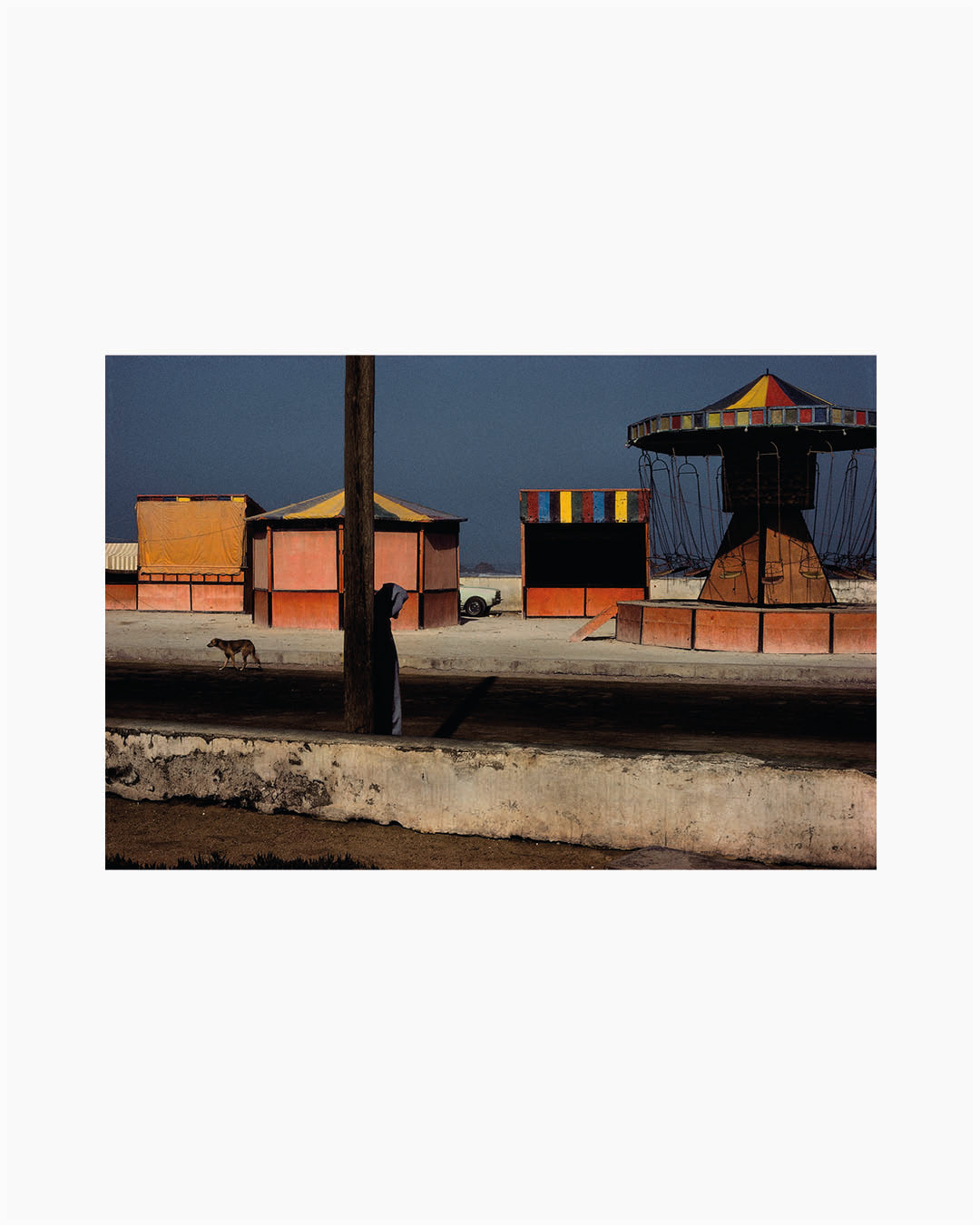 Fine Print: Amusement stands near the beachfront. Essaouira, Morocco, 1988