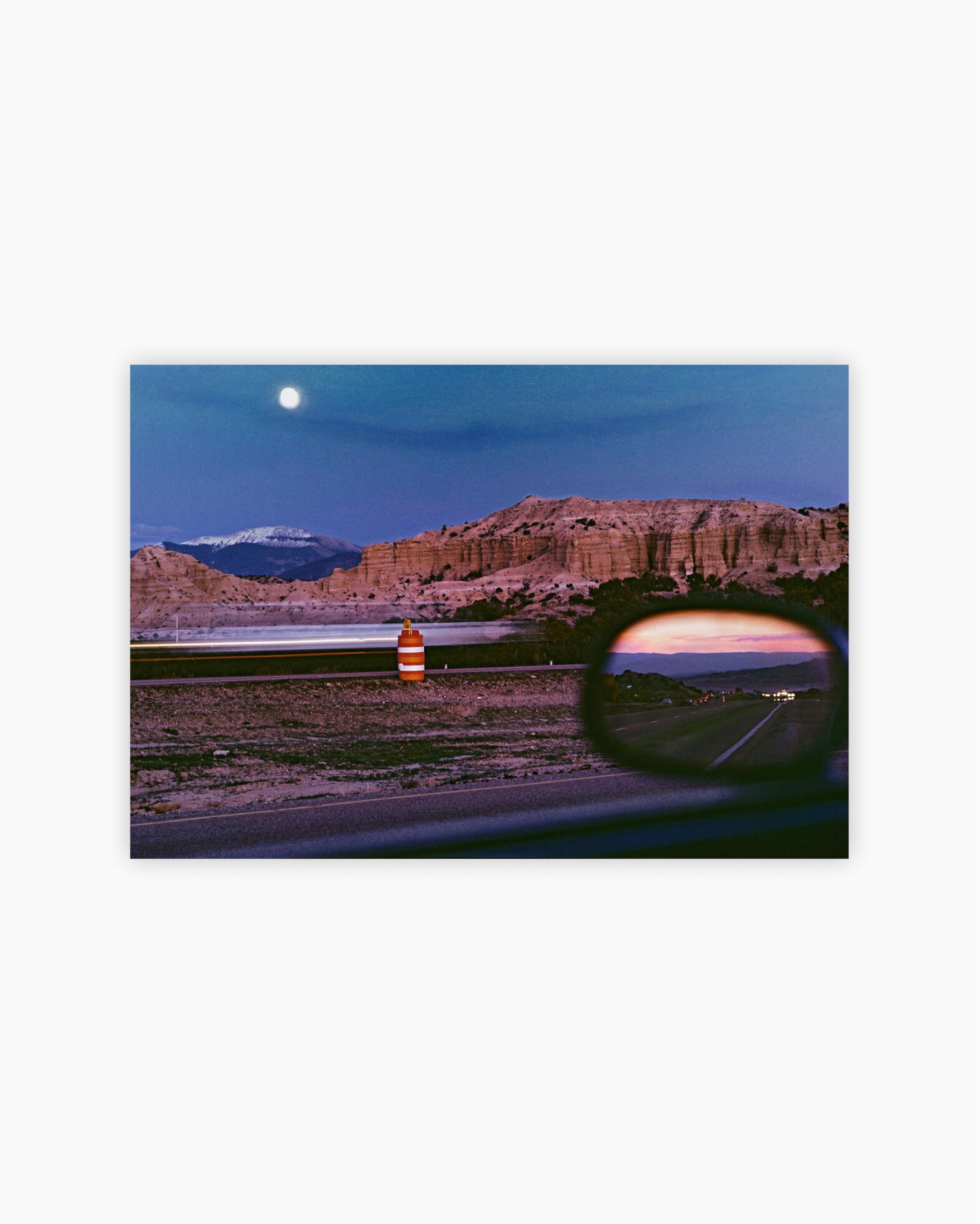 Fine Print: Moonrise along the Albuquerque-Santa Fe highway. New Mexico, 1985