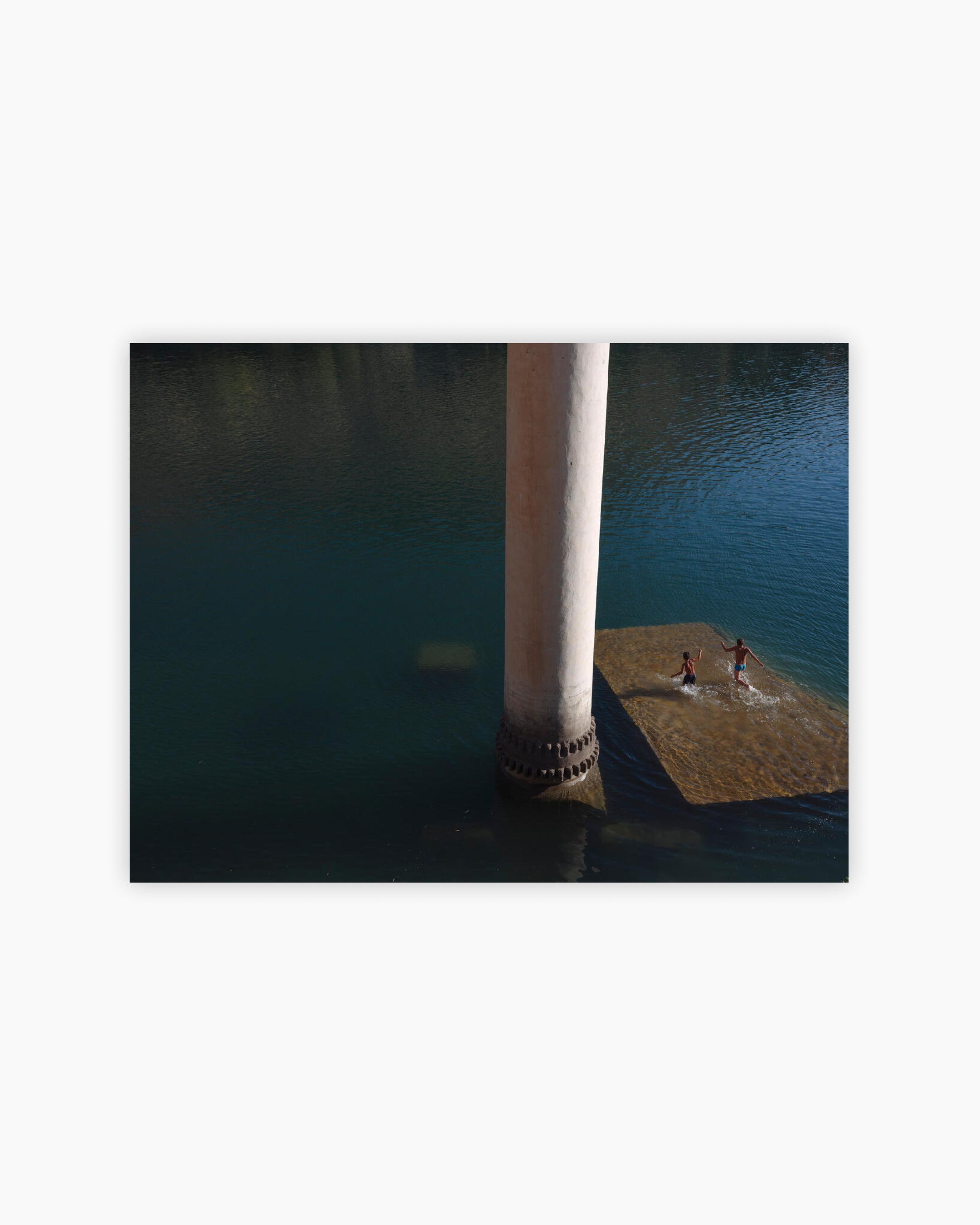 Fine Print: Children play on a sunken mosque. Halfeti, Turkey, 2018