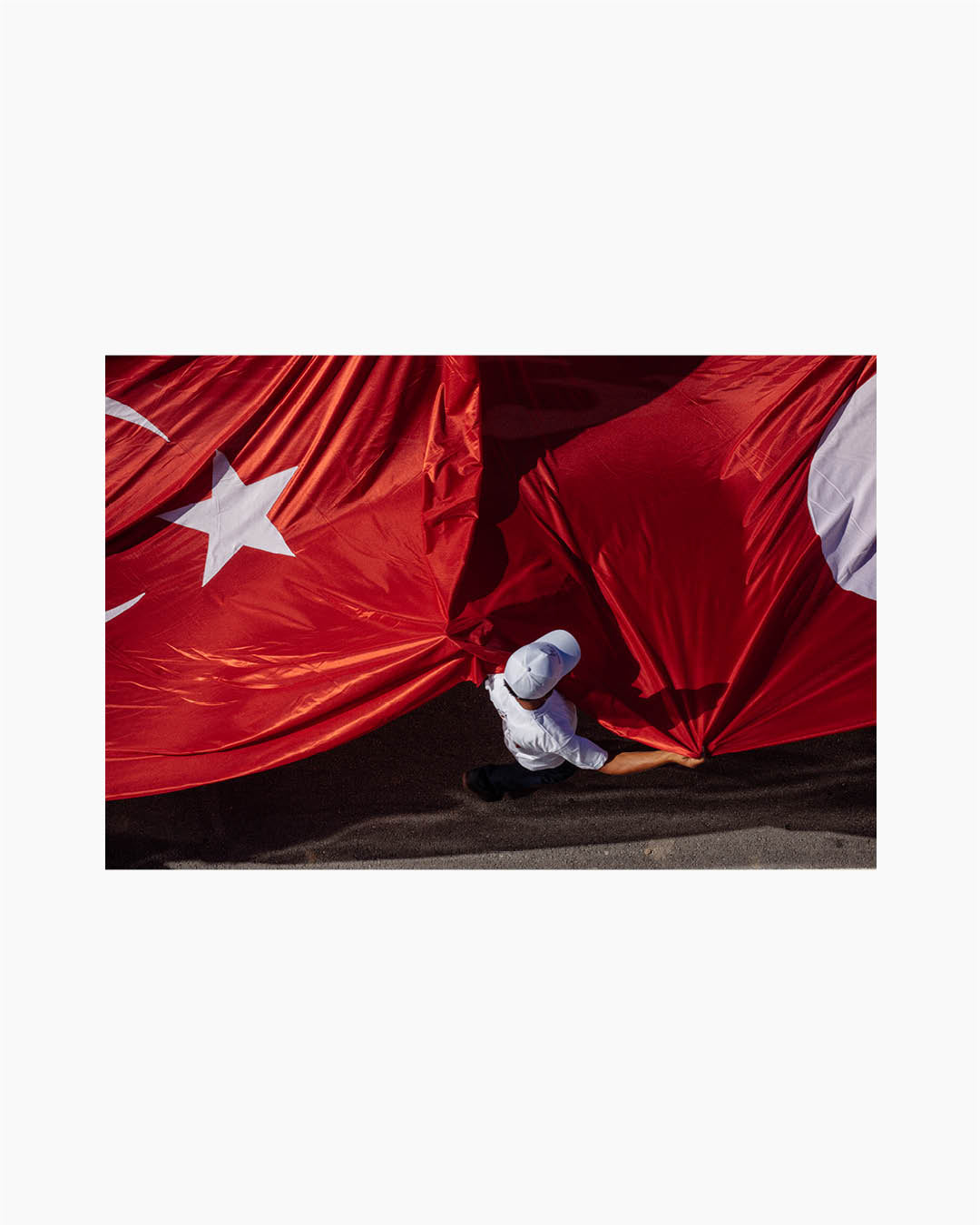 Fine Print: People carrie a 1 km long Turkish flag during Justice March. Turkey, 2017
